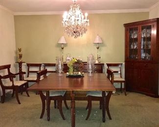 Fabulous vintage solid cherry dining group--drop leaf table with 6 chairs, corner china cabinet and server. All pieces are in excellent condition.