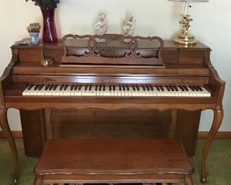Beautiful Rohler and Campbell walnut spinet piano with bench--excellent condition.