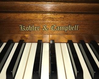 Beautiful Rohler and Campbell walnut spinet piano with bench--excellent condition.