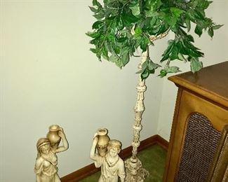 Vintage plaster figurines, faux plant on pedestal.