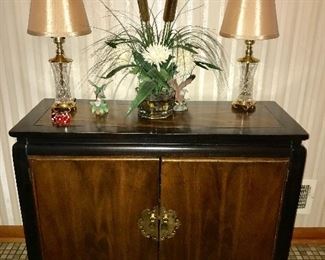 Another wonderful Asian-style crendenza, matching crystal lamps and decor.
