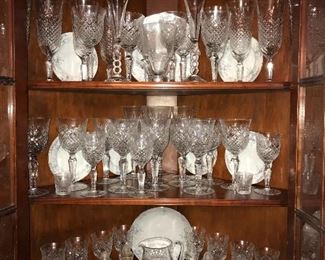 Cabinets packed full of vintage china, crystal, serving pieces, table linens and more. Stemware is American Cut, Brilliant.