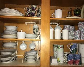 Kitchen full of dishes, glassware, cookware, serving items, utensils and more.