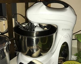 Kitchen full of great items--dinnerware, flatware, bowls, serving pieces, utensils, glassware, and small appliances.