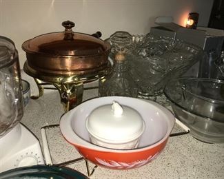 Kitchen full of great items--dinnerware, flatware, bowls, serving pieces, utensils, glassware, and small appliances.