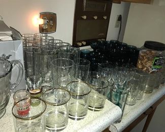 Kitchen full of great items--dinnerware, flatware, bowls, serving pieces, utensils, glassware, and small appliances.