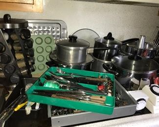 Kitchen full of great items--dinnerware, flatware, bowls, serving pieces, utensils, glassware, and small appliances.