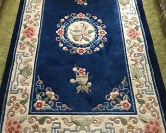 Heavy and plush--wool rug, approximately 5 by 3,