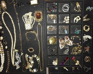 Lots and lots of vintage and con temporary costume jewelry.