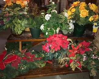 Assorted floral arrangements and wreaths.