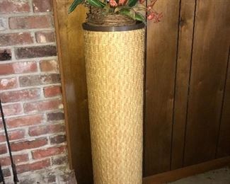 Woven pedestal--shown with floral arrangement.