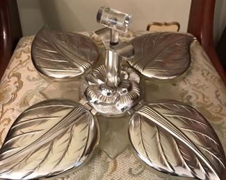 Vintage plastic server--press lucite handle in middle and the leaves lift back.