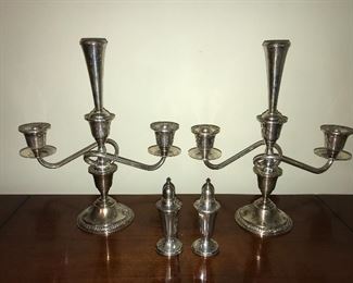 Pair weighted sterling candelabra and salt and pepper shakers.