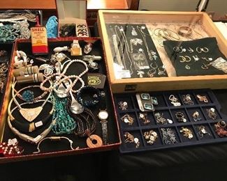 Lots and lots of vintage and contemporary costume jewelry and some gold and silver pieces.