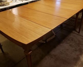 Antique Wally Wabash dining room table. Three leaves. Folds up into a very compact size