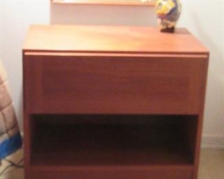 Pair of teak nightstands w/ top drawer and lower cubby-hole