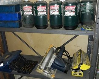Metal Shelves and Contents, 16.4 oz Propane Bottles, Parts, Ryobi Circular Saw Model# CSB121, Drill Bits, and More
