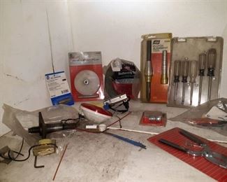 Contents of Shelf, Bearing Packer, Clutch Alignment Tool, Circuit Tester, Chisel Set, Oil Pressure Tester, and More