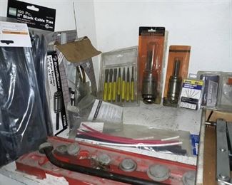 Contents of Shelf, Chisels, Tailpipe Expanders, Assorted Rivets, Pry Bar Set, Long Shaft Screwdriver Set, Oxygen Sensor Tester, Valve Spring Compressor, and More