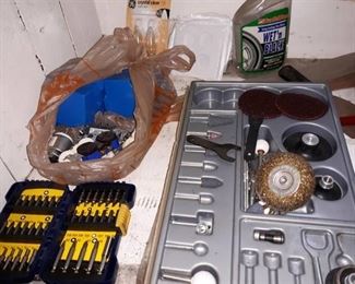 4 Shelf Wooden Shelves and Contents of Bottom Shelf, Drill Bits, Dremel Parts, Pry Bars, Parts, Gear Puller, and More