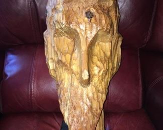 Wooden hand carved head
