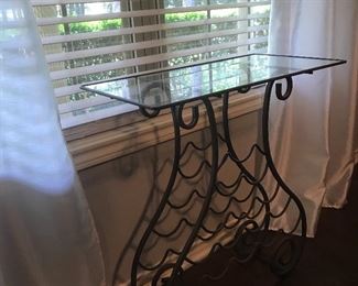 Mteal base glass top table