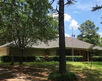 House is set in shady woods, acreage and quite.