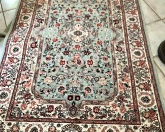 4 x 6' hand-knotted accent rug.  