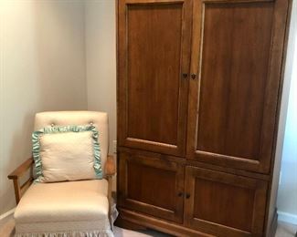 Beautiful wardrobe and quaint rocking chair.  