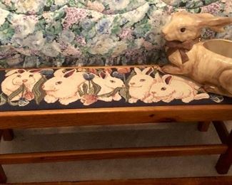 Bunny accent footstool in needlepoint and bunny ceramic planter.  