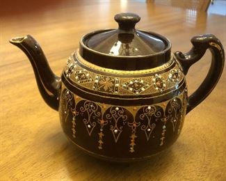 Absolutely beautiful teapot from the 1800's.  Detail in turquoise, orange, and gold.    