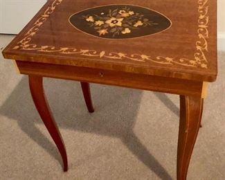 Inlaid music box table.