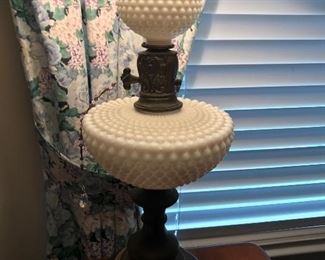 Two antique milk glass lamps. 