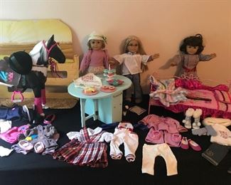 American Girl Dolls, clothes, table and food items, horse and corral.