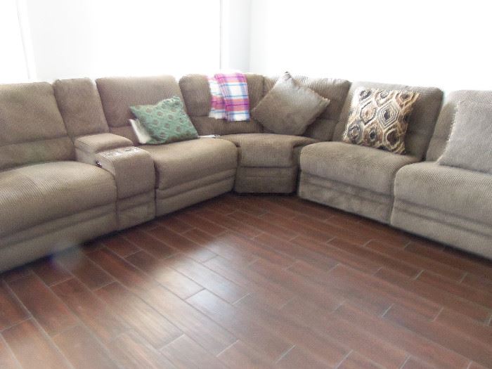 WRAP AROUND SOFA WITH AUTO RECLINERS.  IN EXCELLENT CONDITION.  COLOR IS MISLEADING IN THE PICTURES.  IT IS ACTUALLY CHOCOLATE BROWN. 
