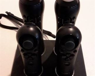 dreamGear dock displayed with Sony motion and navigation controllers (sold separately).