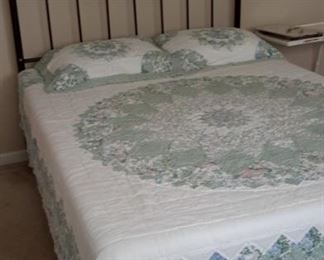 Queen metal headboard, quilt and Tempurpedic mattress and box springs.