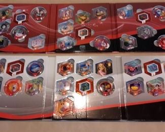 Disney Infinity character game pieces, in boxes.