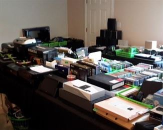 Everything from routers, switches, hubs, chargers, monitoring kits, webcams, headsets, game controllers, docks, keyboards, monitors, laptops, Apple products to stereo cabinets, shelves, tv stands, printers, books, music and MORE!!