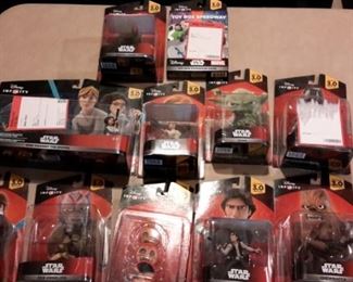 Disney Infinity Star Wars figures and power packs, new in box.