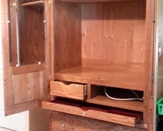 Oak armoire/TV cabinet with 4 drawers (one felt-lined drawer for jewelry) and mirror.