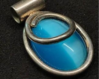 S010 Sterling Pendant With Iridescent Blue Stone