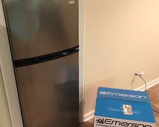 Whirlpool apartment size refrigerator brand new and Emerson compact refrigerator still in box