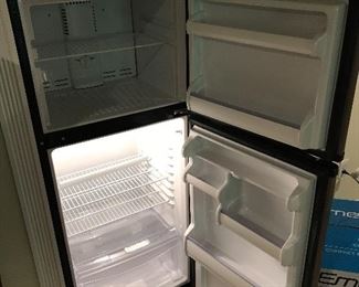 Inside photo of whirlpool apartment sized refrigerator