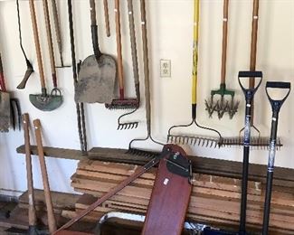 Lawn tools, one by tens and sailboat centerpiece and tiller 