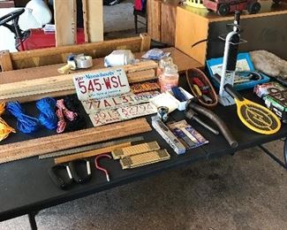 License plates, yardsticks, bicycle pumps, tubes and flat repair kits