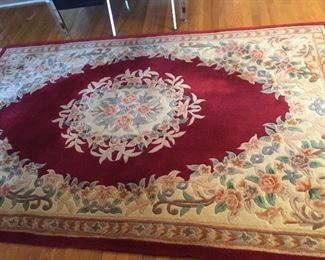 Woolen oriental red rug