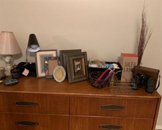 Mid-century dresser, small frames, salt lamp, vintage binoculars, office lamp, desk lamp, glass mobile 