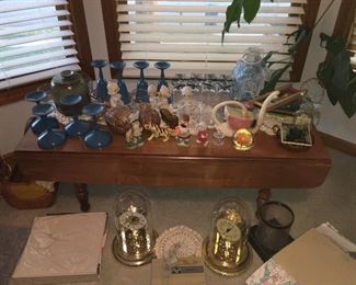 Coffee Table and Blue glassware, etc, Mantle clocks