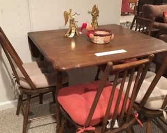 Drop leaf table with 4+ chairs available